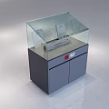 Modern Glass Covered Display Case Featuring Gray Cabinet Red Logo And Items
