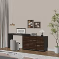 Modern Wooden Dresser With Drawers Wall Art Table Lamp And Green Plant Chair