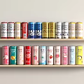 Colorful Canned Beverages Arranged on Wooden Shelves with BIG CHE ELIX and Other Brand Labels