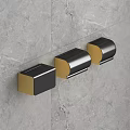 Wall Mounted Black Gold Storage Organizers On Grey Marble Wall Surface