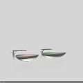 Two Oval Shaped Pastel Pink And Mint Green Washbasins With Metal Stands And Countertops