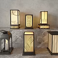 Outdoor Lamps With Modern Geometric Cutout Patterns And Metal Frames Displayed On Stone Surface