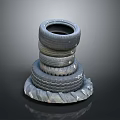 Car Tires Stacked in Pyramid Shape with Various Sizes and Worn Tread Patterns