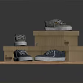 Grey Casual Sneakers Displayed On Stacked Cardboard Boxes For Home Use