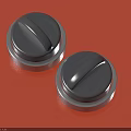 Two Black Control Knobs on Red Background with Silver Edges And Black Levers