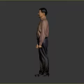 The Man Standing Against Gray Background In Pink Shirt Dark Pants And Black Shoes