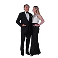 Two People In Formal Suit And Evening Gown Standing Together