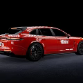 Red Luxury Sports Estate Car With Sleek Body And Black Alloy Wheels