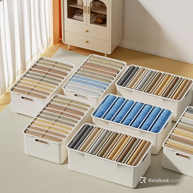 Colorful Clothes Neatly Folded and Organized in White Storage Boxes with Natural Light 3d model 