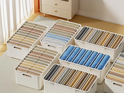Colorful Clothes Neatly Folded and Organized in White Storage Boxes with Natural Light 3d model