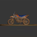 Muddy Blue And Red Off Road Motorcycle With Number 36 On Dirt Terrain