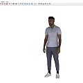 Man Standing in Gray Polo Shirt Dark Pants and White Shoes Casually