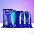 Transparent Blue Display Shelf For Sonic Electric Toothbrushes And Toothpaste With Information Labels