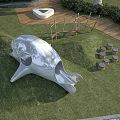 White Dolphin Head Garden Sculpture on Green Lawn with Trees and Barrel Decorations