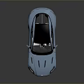 Sleek Blue Sports Car With Black Roof And Aerodynamic Exterior Design