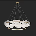 Modern Chandelier With White Circular Shades And Gold Metal Rings Hanging In Dark Interior