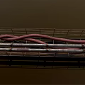Metal Pipes And Red Hoses Arranged On Metal Grid Support Structure