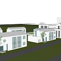 Modern White Office Buildings With Green Lawn And Trees Under Cloudy Sky