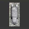Artistic Stone Elephant Sculpture in Reclining Position on Textured Stone Base