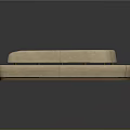 Elegant Beige Upholstered Curved Sofa With Modern Design And Smooth Surface