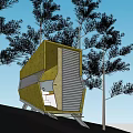 Small Modern Green Building On Hillside With Trees And Support Legs