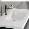White Bathroom Washbasin on Sleek Countertop with Modern Silver Faucet and Toiletries