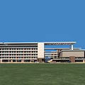 Modern School Building Design With Green Roof Sports Field And Surrounding Trees