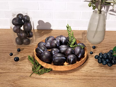 Black Fruits on Wooden Plate with Green Leaves Scattered Small Fruits Near Transparent Vase 3d model