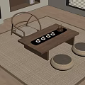 Natural Style Wooden Tea Table With Chair Floor Cushions And Tea Set On Rug