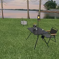 Black Metal Outdoor Table With Portable Stove Cups And Folding Chair On Grass