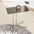 Modern Minimalist Side Table With Black Tabletop And Metal Legs Featuring Coffee Cup On Top