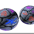 Two Wooden Stone Spheres With Cracked Surface And Colorful Orange Purple Blue Patterns