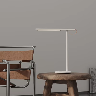 White Desk Lamp On Wooden Small Round Table With Brown Chair And Gray Wall 3d model