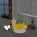 Bright Kitchen Counter With Lemon Bowl Potted Plant Glass Jars And White Cabinets