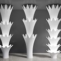 Modern Interior With Three Decorative White Petal Shaped Illuminated Columns