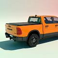 Orange RAM Pickup Truck With Black Roof Off Road Style And Alloy Wheels