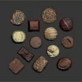 Assorted Chocolate Candies With Various Flavors Different Shapes And Decorative Toppings