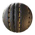 Close Up View Of Brown Leather Ball With White Stitches And Textured Surface