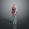 Woman In Traditional Purple Floral Top With Headscarf And Green White Striped Skirt With Reflection