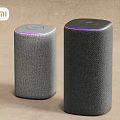 MI Smart Speakers With Fabric Material And Purple Indicator Lights In Cylindrical Design