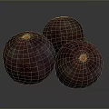 Three Dark Red Round Textured Fruits With Orange Tops On Dark Background