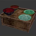 Carved Sculptural Red Bowls And Green Openwork Plates Displayed On Wooden Box