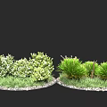 Two Green Plant Arrangements With Bushes Grass White Flowers And Pebble Base