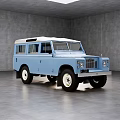 Classic Blue Off Road Vehicle With Vintage Design Roof Windows And White Wall Wheels