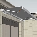 Outdoor Retractable Awning With Beige Fabric And Metal Frame On Building Exterior