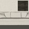 Light Beige Sectional Sofa With Throw Pillows And Black Wall Art On Light Colored Wall