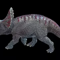 Vibrant Triceratops Dinosaur Model Featuring Detailed Skin And Red Frill