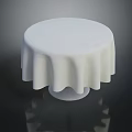 Stylish Round White Table With Pleated Tablecloth And Smooth Base Design