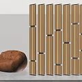 Modern Wooden Room Divider With Metal Accents And Brown Bean Bag Chair
