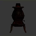 Vintage Cast Iron Stove With Three Legged Design And Textured Surface